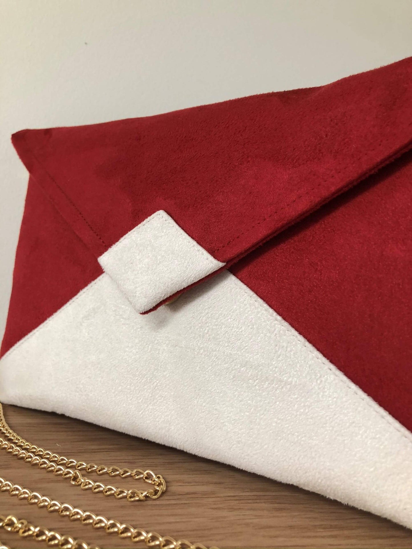 Red and ivory Isa clutch bag without sequins