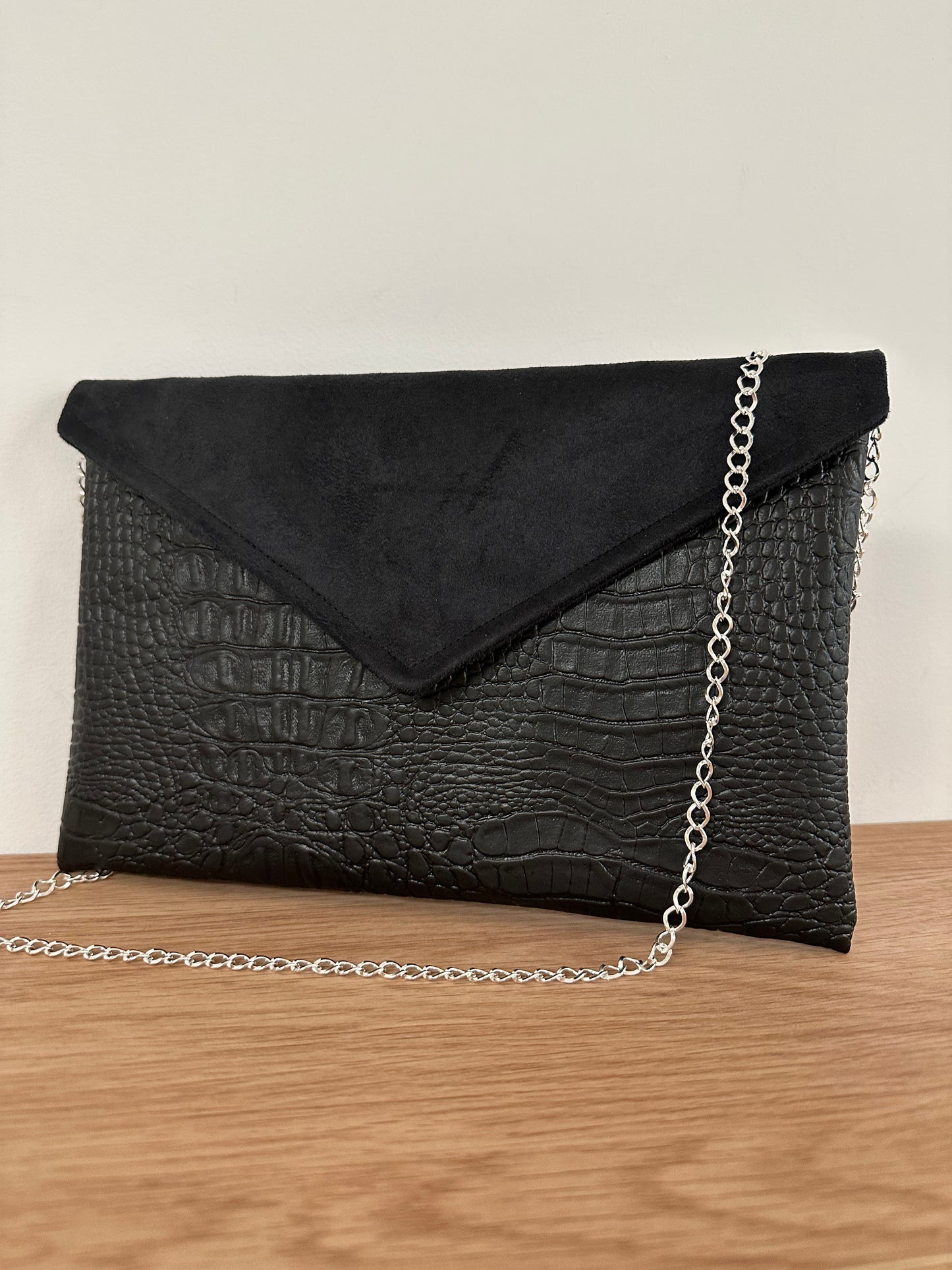 Isa clutch bag matte black reptile style