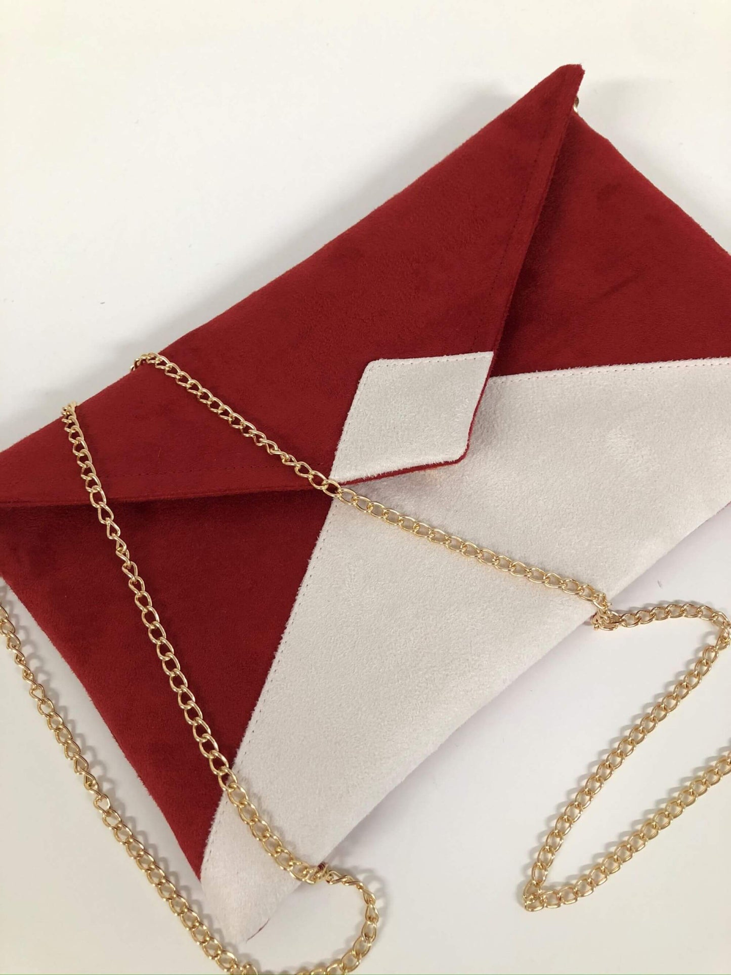 Red and ivory Isa clutch bag without sequins