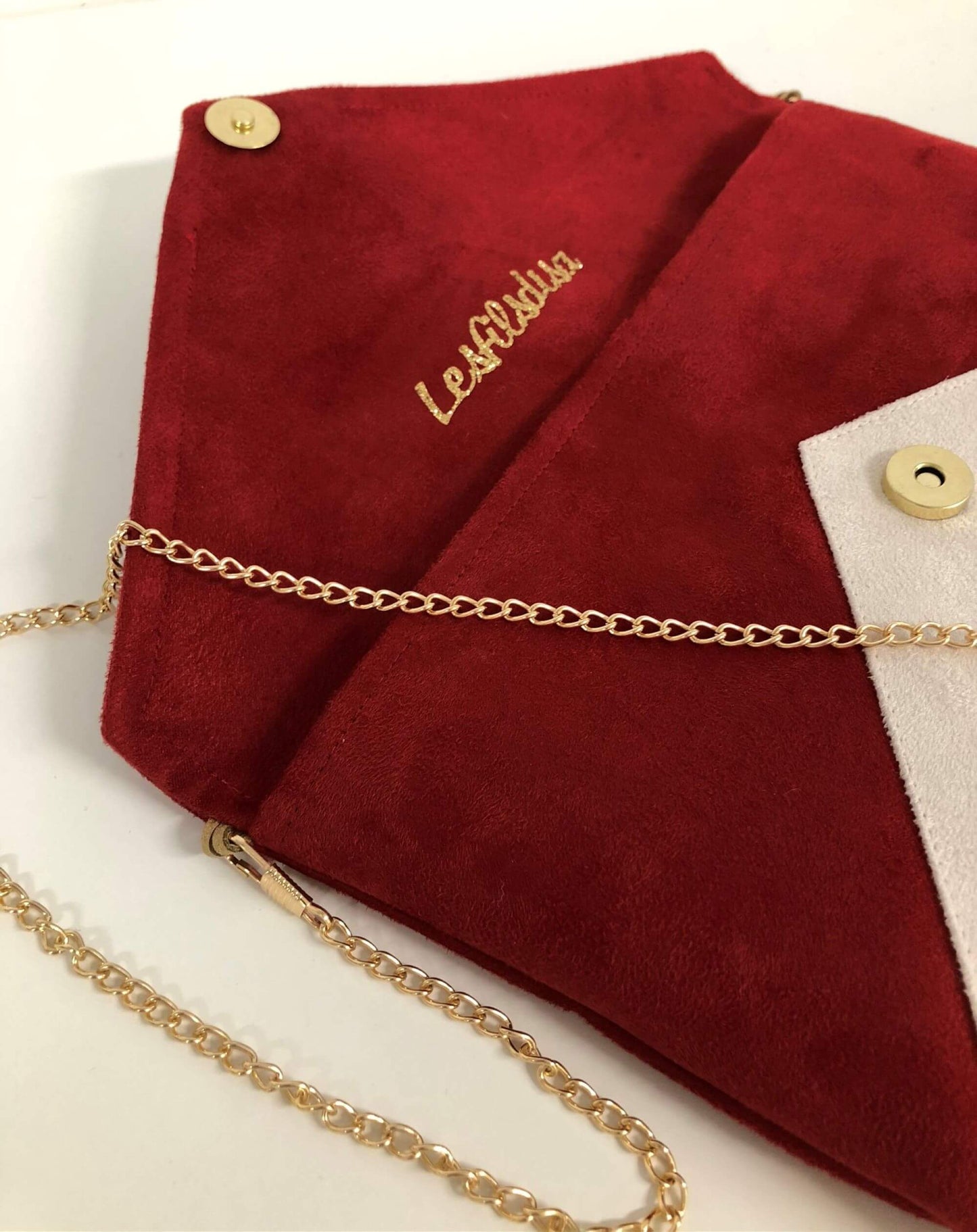 Red and ivory Isa clutch bag without sequins