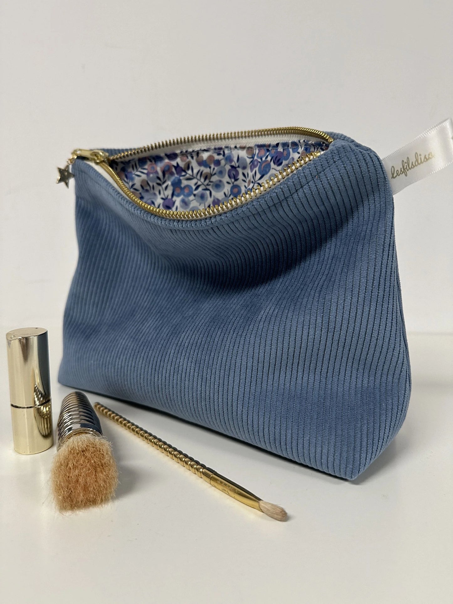 Pochette en velours côtelé bleu azur