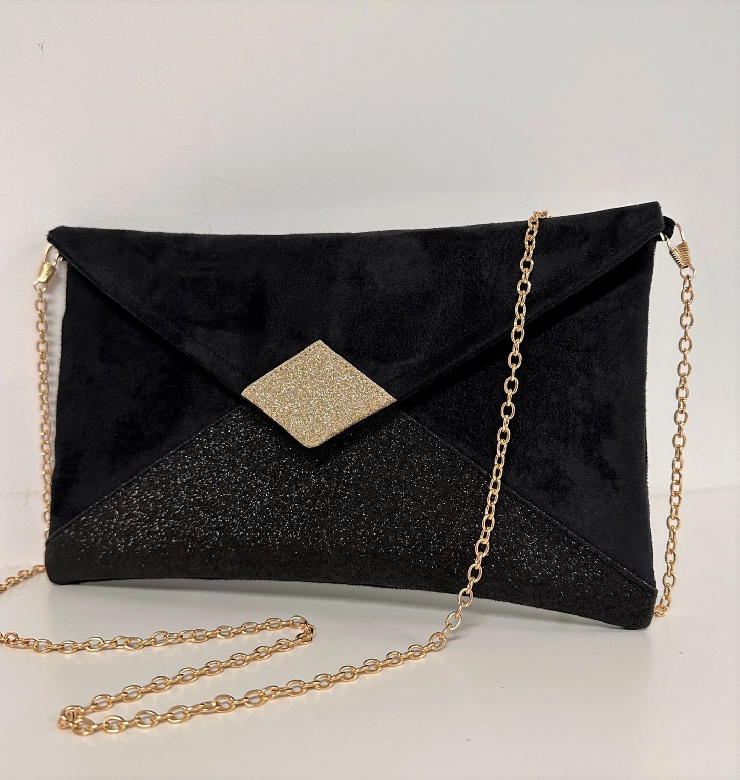 Sac pochette Isa noir et doré à paillettes vue de face