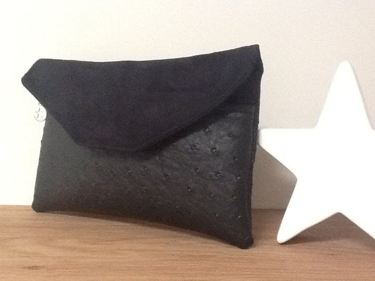 Matte black ostrich-look bag companion