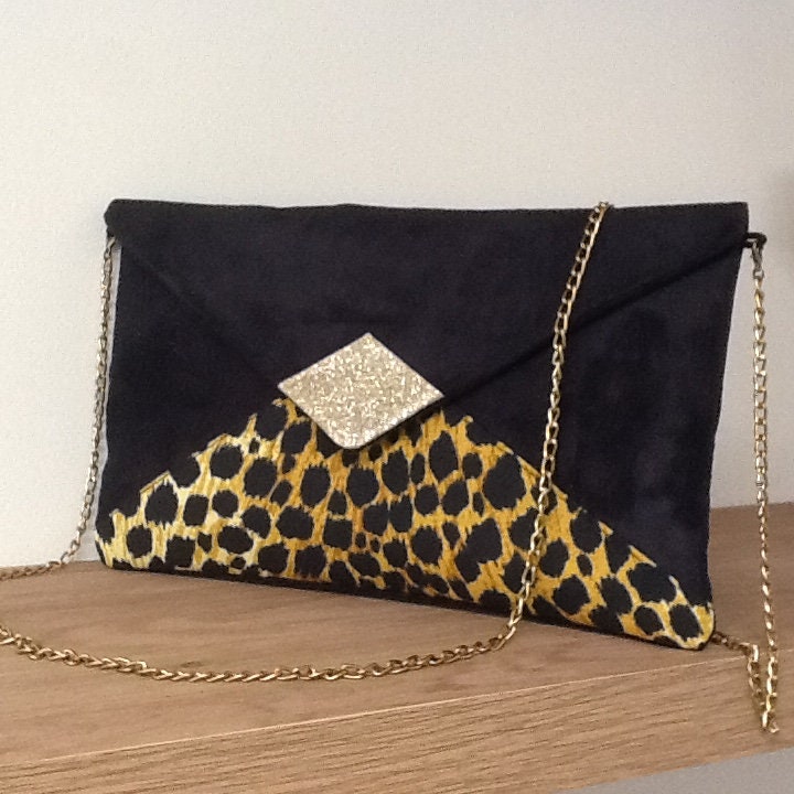 Sac pochette Isa noir et léopard à paillettes dorées