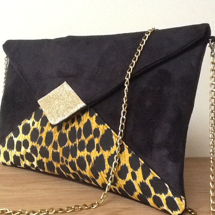Sac pochette Isa noir et léopard à paillettes dorées
