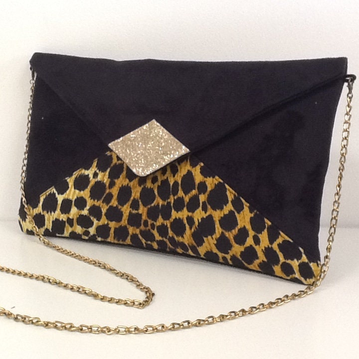 Sac pochette Isa noir et léopard à paillettes dorées