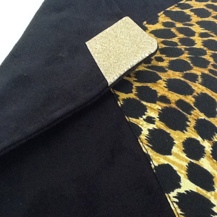 Sac pochette Isa noir et léopard à paillettes dorées