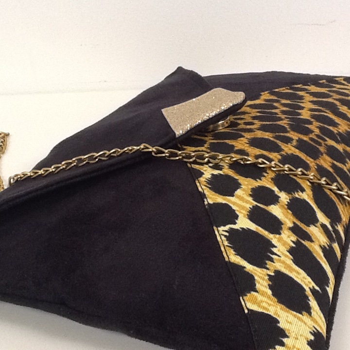 Sac pochette Isa noir et léopard à paillettes dorées