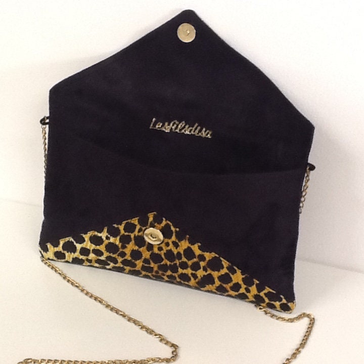 Sac pochette Isa noir et léopard à paillettes dorées