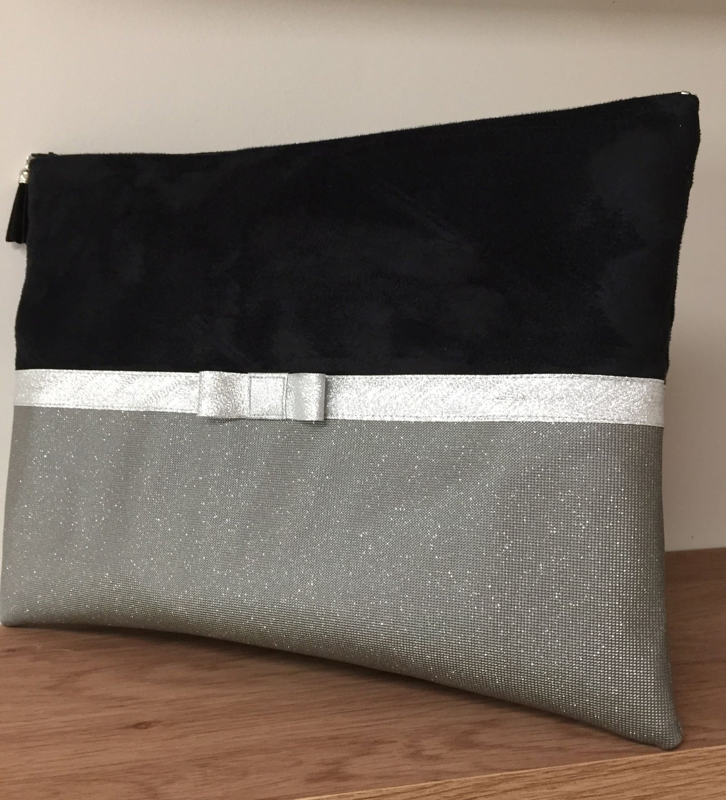 Black and gray laptop bag with silver bow