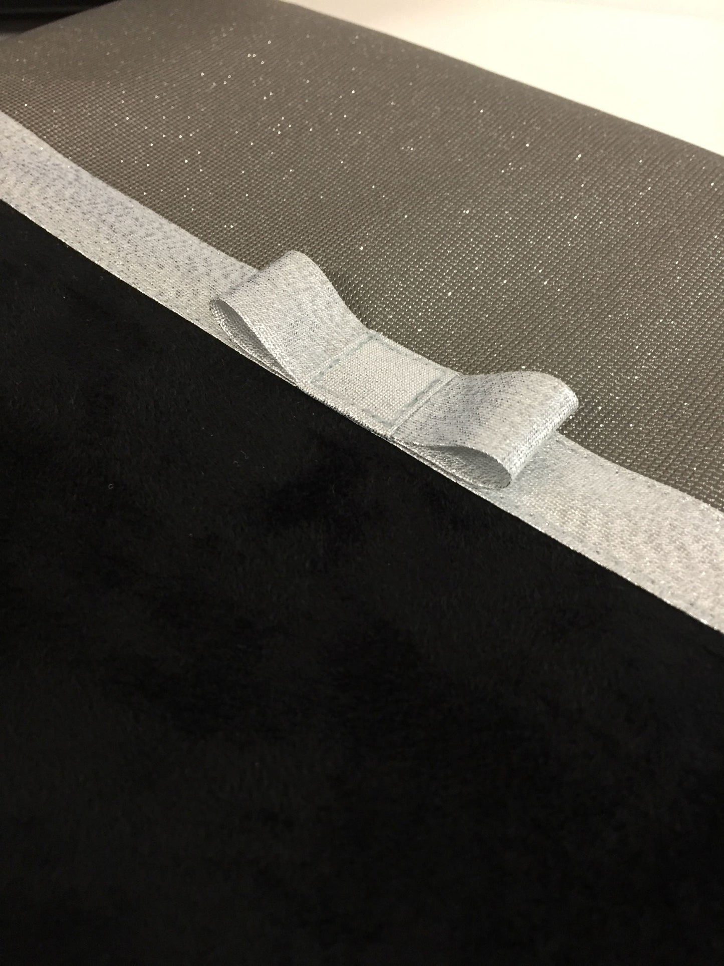 Black and gray laptop bag with silver bow
