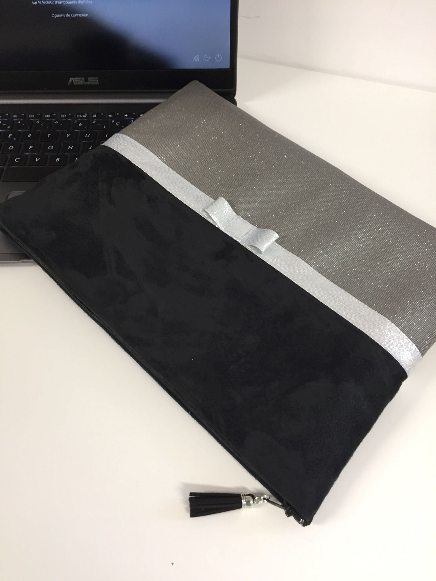 Black and gray laptop bag with silver bow