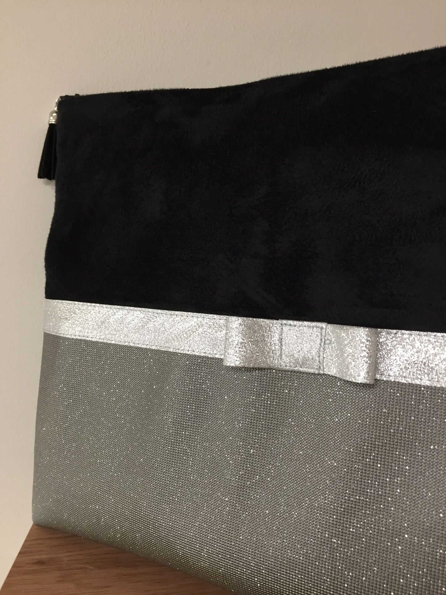 Black and gray laptop bag with silver bow