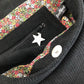La poche zippée intérieure du sac hobo Lesfilsdisa en velours côtelé noir