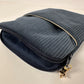 La pochette liseuse Lesfilsdisa en velours côtelé bleu canard, ouverte