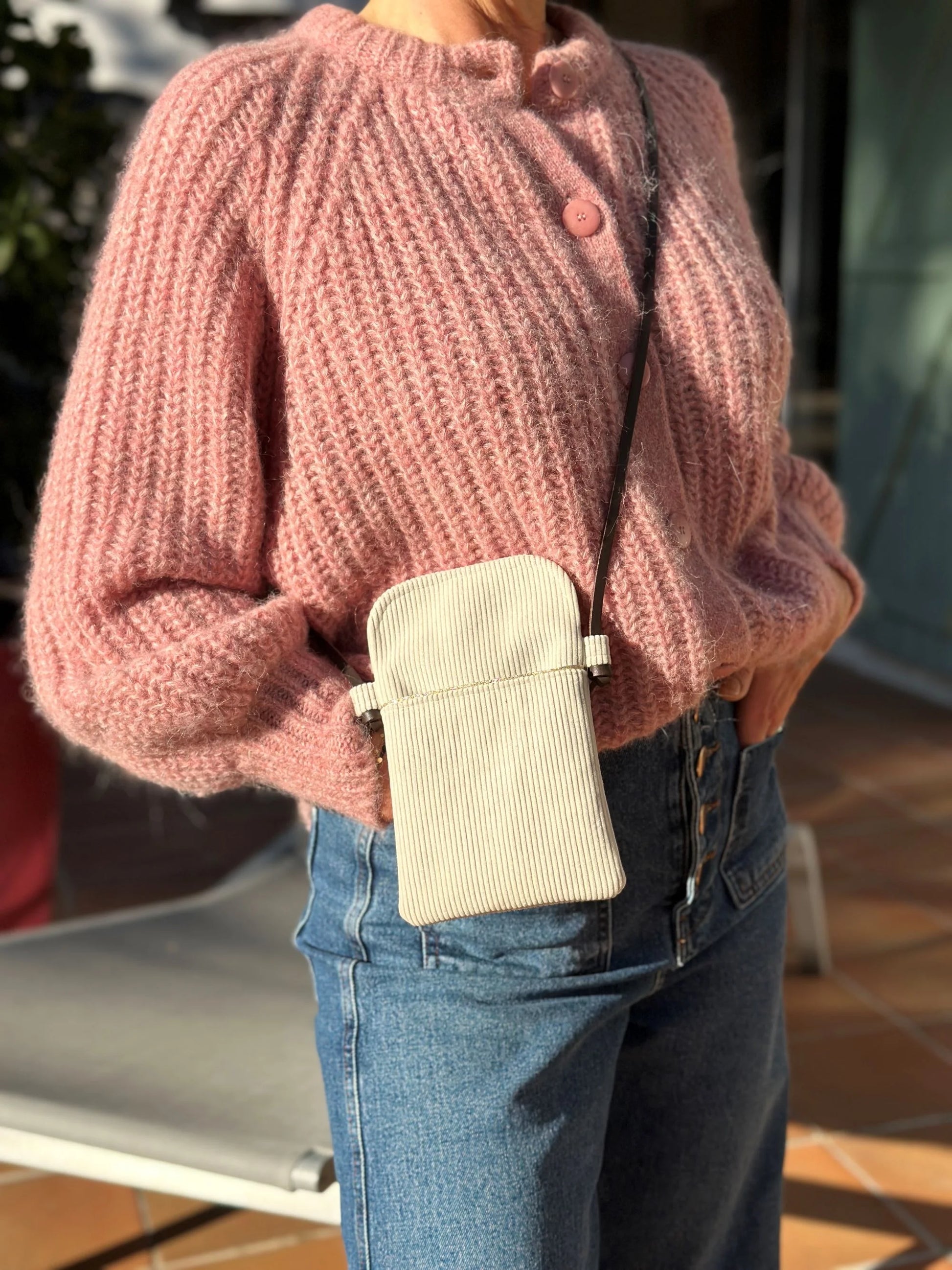 Crossbody phone pouch in ivory corduroy and leather