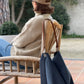 Le style sportswear du sac hobo Lesfilsdisa en velours côtelé bleu canard et cuir