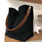 le sac hobo Lesfilsdisa en velours cotelé noir avec une anse cuir marron