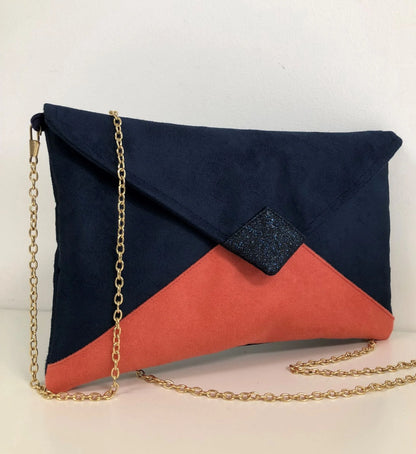 Isa clutch bag in navy blue and coral with navy sequins