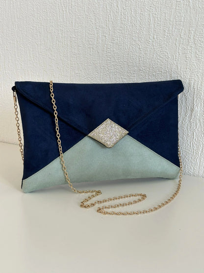 Le sac pochette Isa bleu marine, vert amande et paillettes dorées.