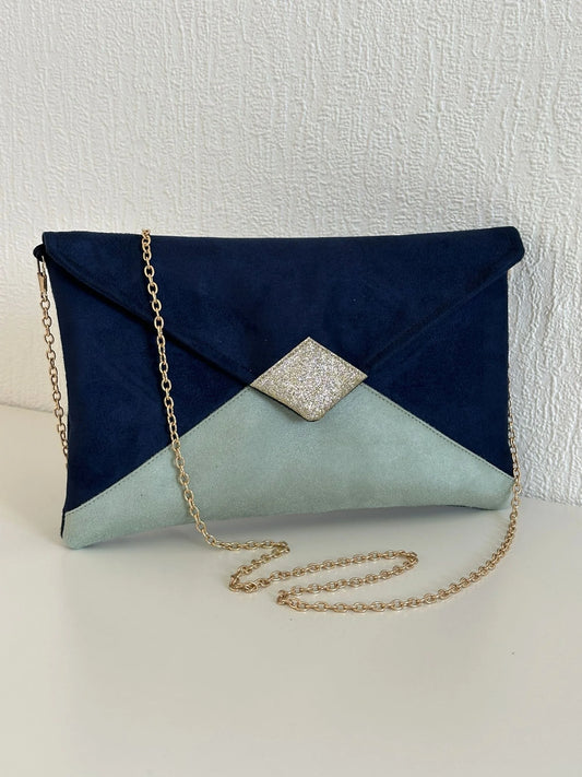 Le sac pochette Isa bleu marine, vert amande et paillettes dorées.