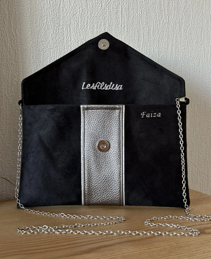 Exemple de personnalisation intérieure du sac pochette Isa noir et gris irisé à liseré argenté.