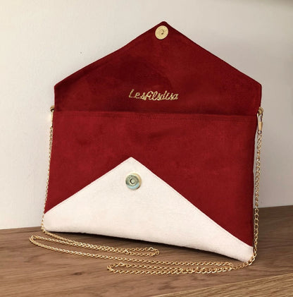 Le sac pochette Isa rouge et ivoire sans paillettes, ouvert.