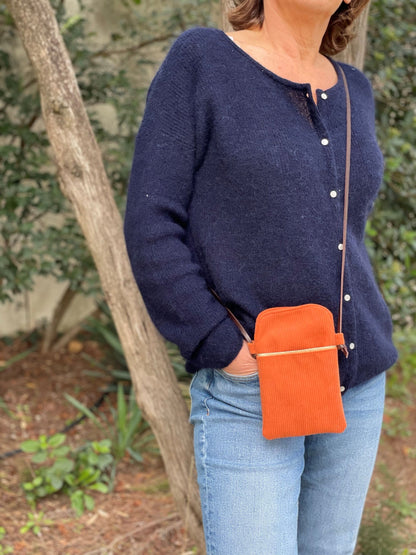 Orange corduroy and leather shoulder phone pouch