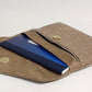 Beige reptile aspect bag companion