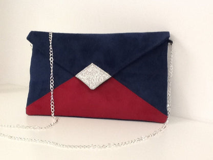 Isa clutch bag in navy blue and fuchsia with silver sequins
