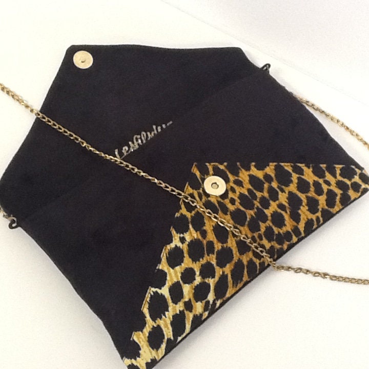 Isa clutch bag black and leopard with gold sequins
