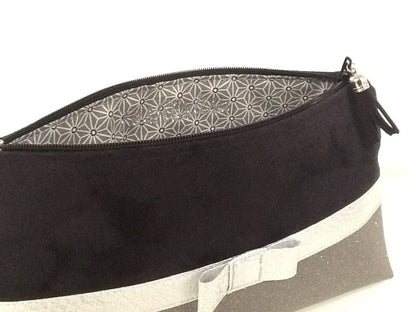 Black and gray makeup bag with silver bow