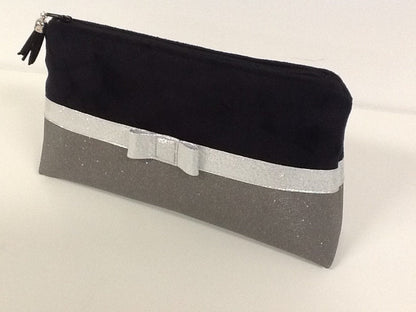Black and gray makeup bag with silver bow