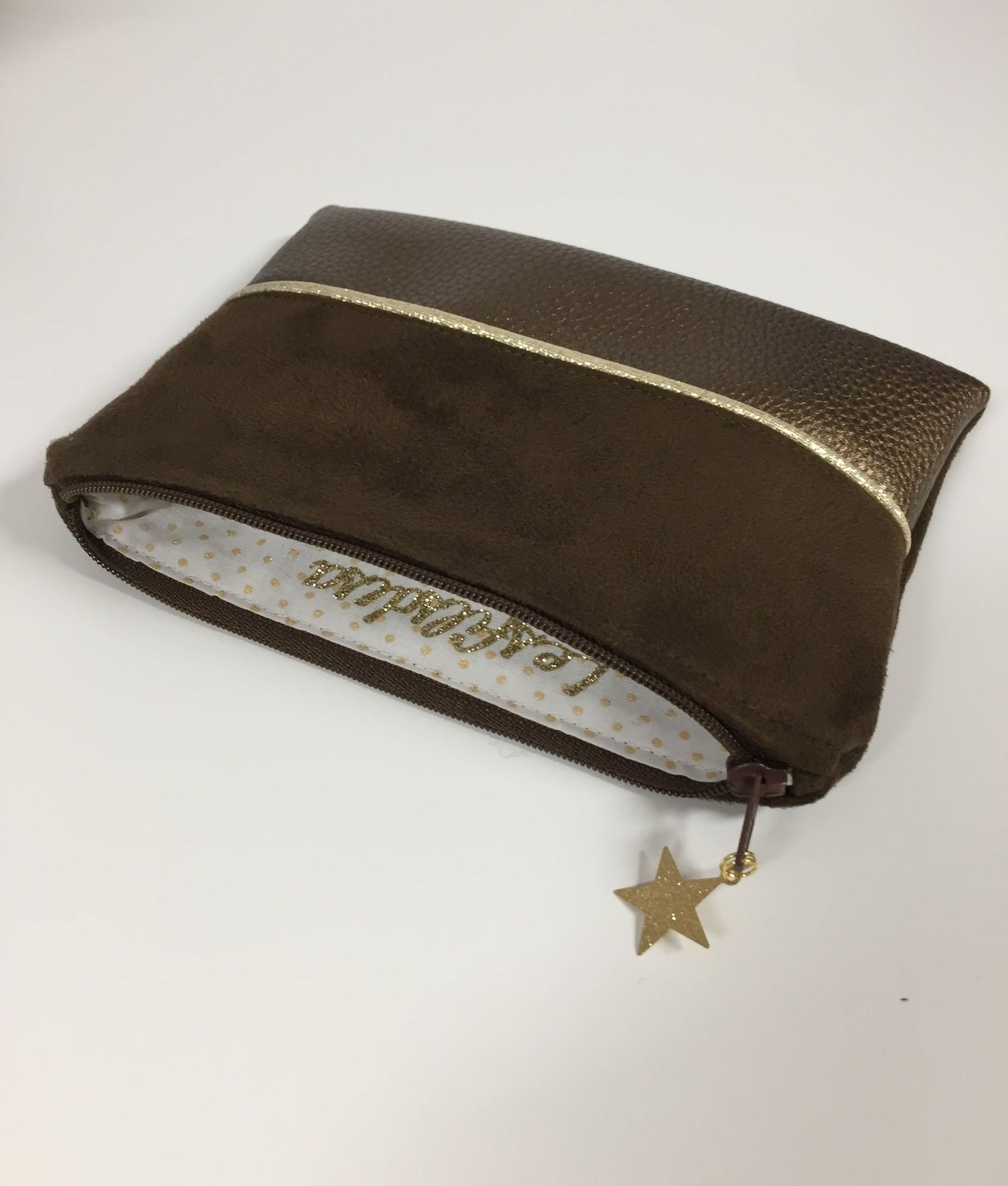 Brown and gold coin purse