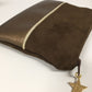 Brown and gold coin purse