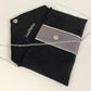 Black and iridescent gray Isa clutch bag with silver trim