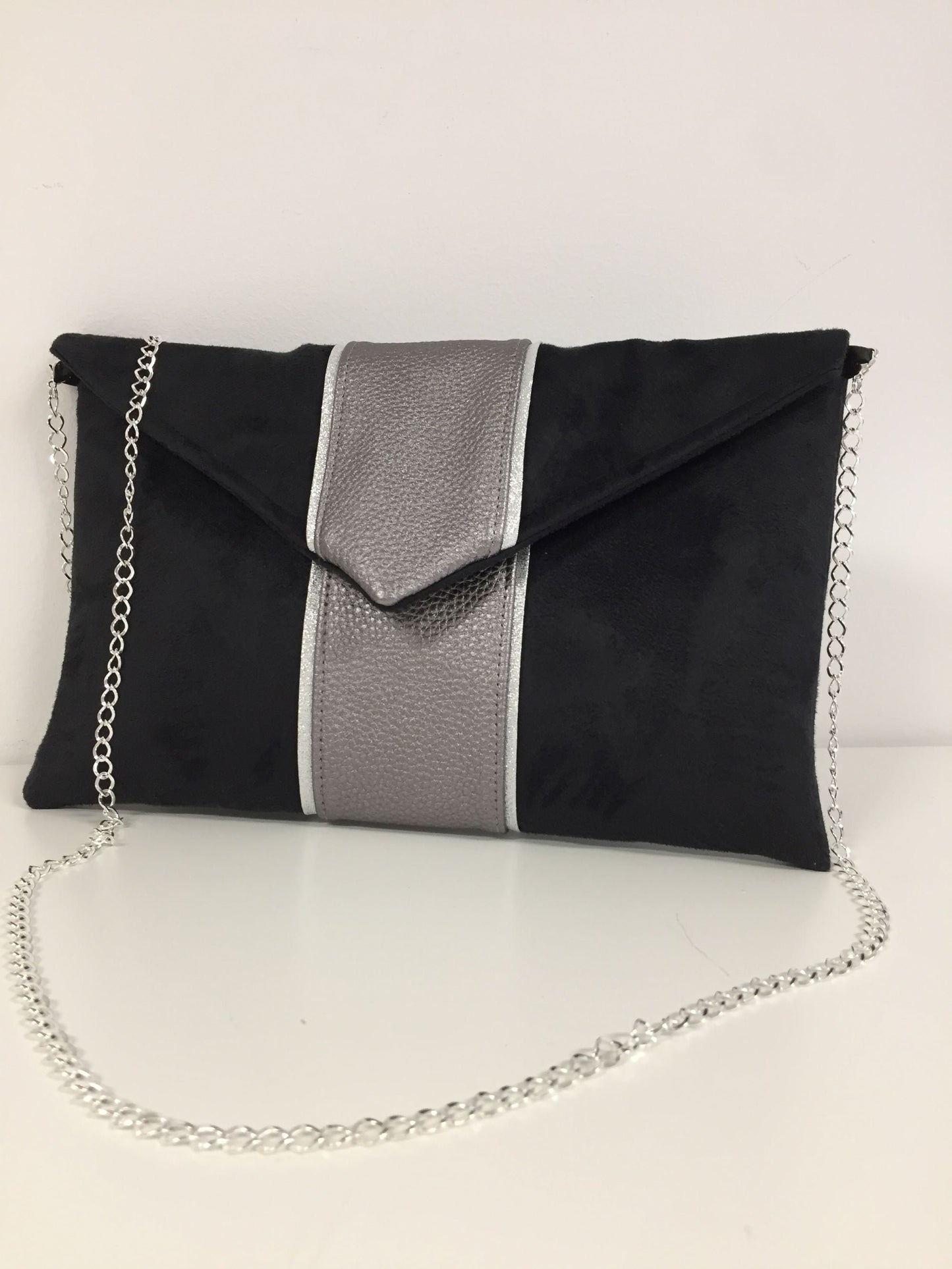 Black and iridescent gray Isa clutch bag with silver trim