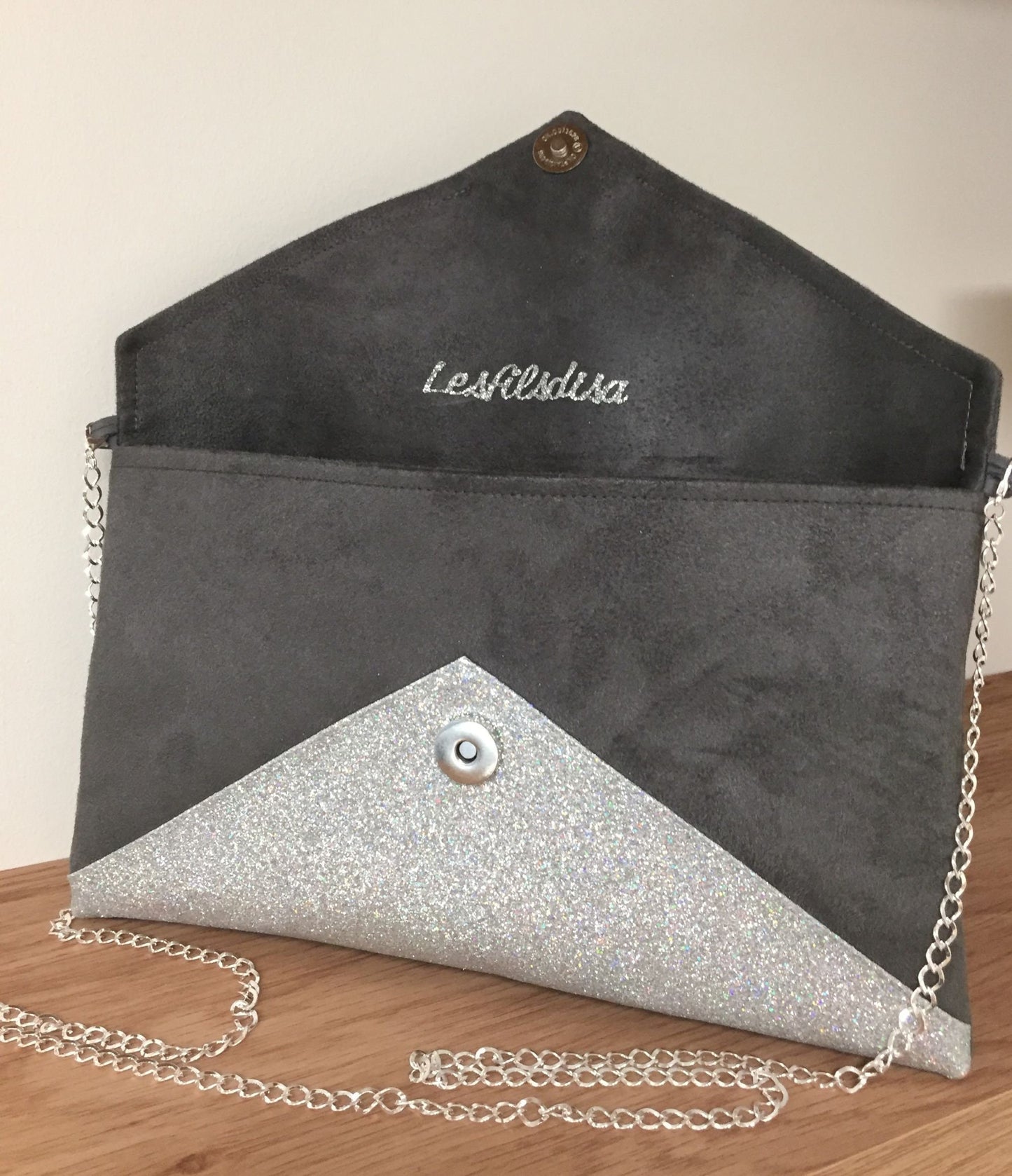 Mouse gray Isa clutch bag with silver sequins