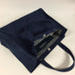 The navy blue shopper bag