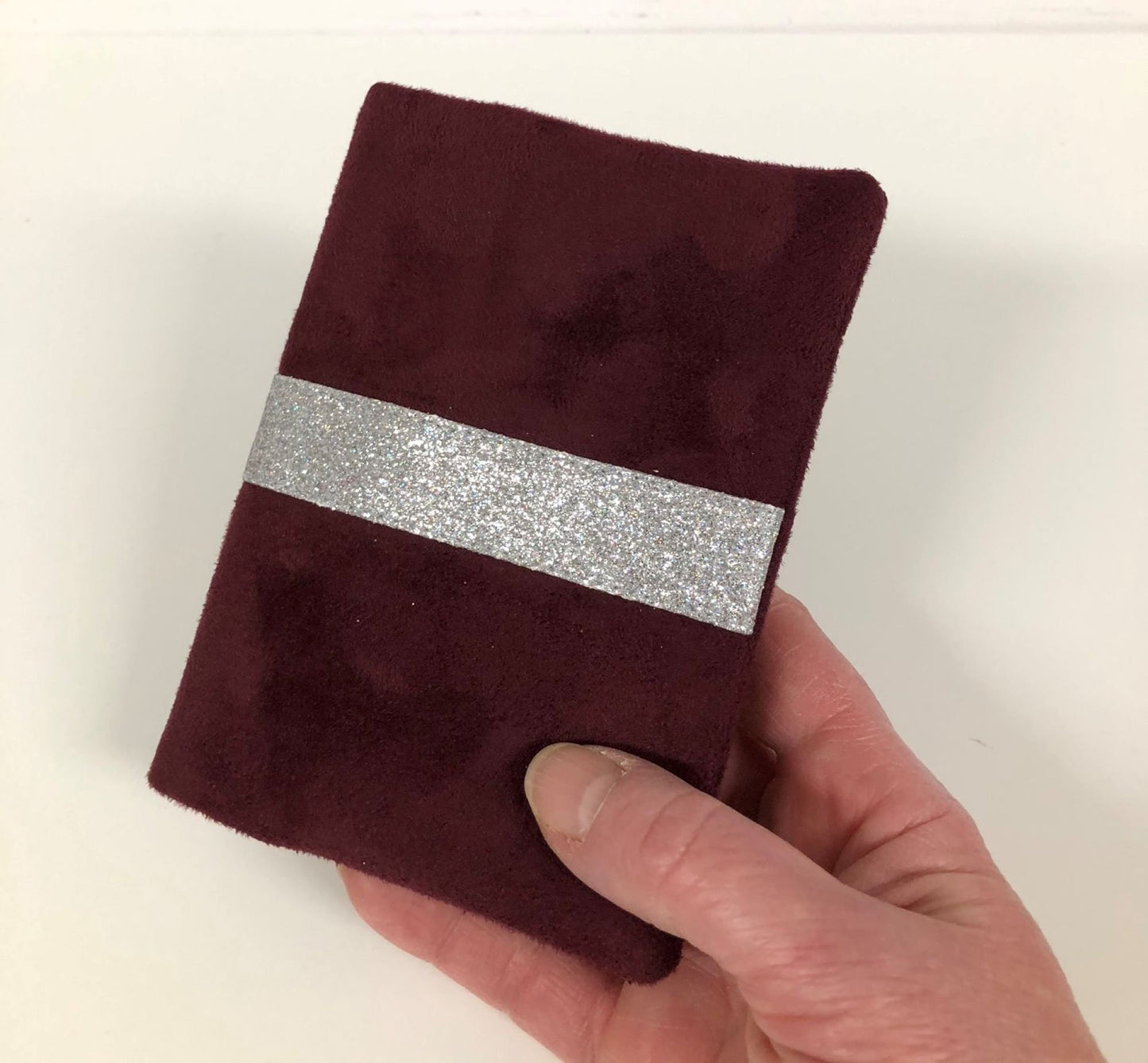 Burgundy passport cover with silver sequins