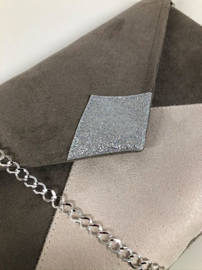 Isa clutch bag in taupe gray and ecru with silver sequins