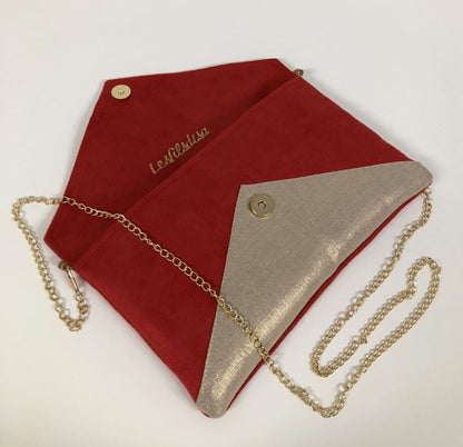 Red Isa clutch bag in linen and gold sequins