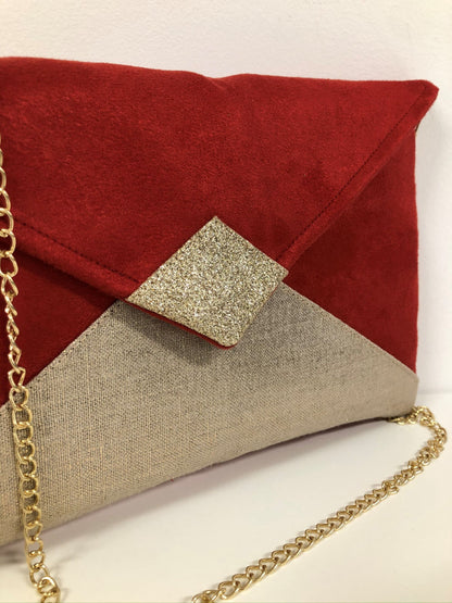 Red Isa clutch bag in linen and gold sequins