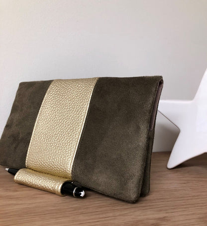 Brown and gold checkbook holder with pen holder