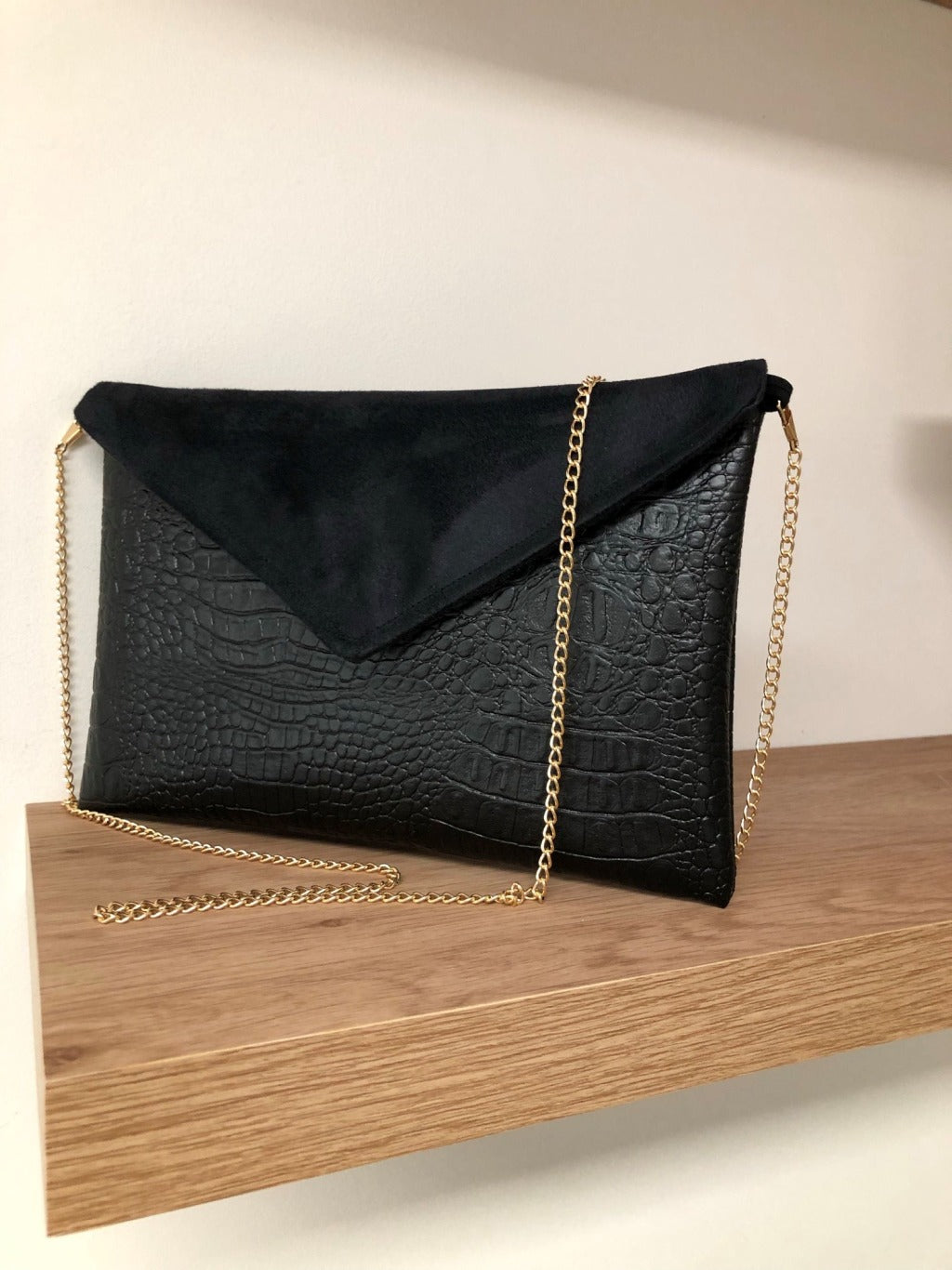 Matte black Isa clutch bag in reptile style ⎪ Lesfilsdisa