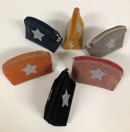 Small orange corduroy coin purse with glitter stars