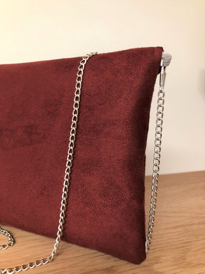 Isa burgundy clutch bag with silver sequins