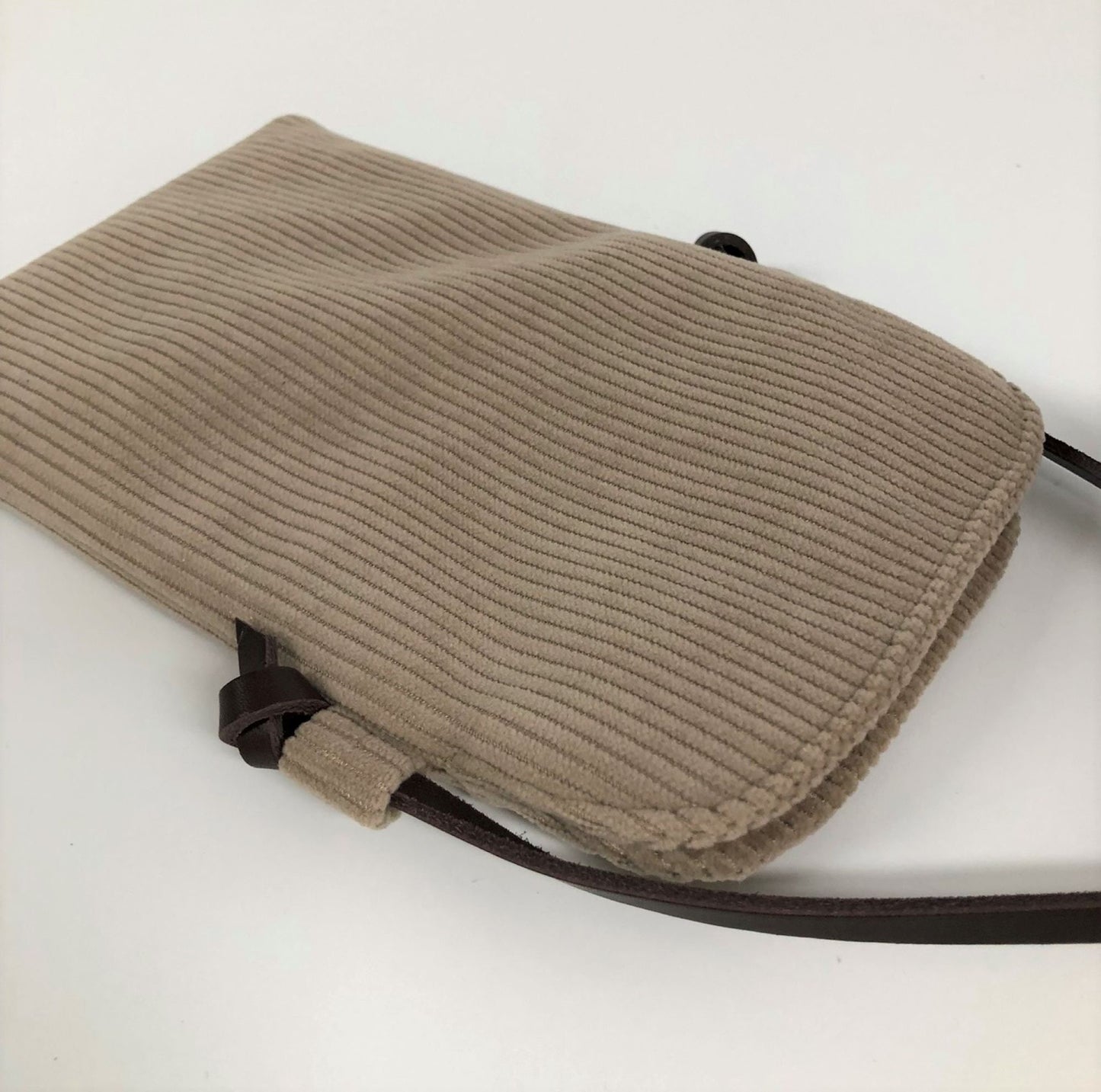 Crossbody phone pouch in beige corduroy and leather